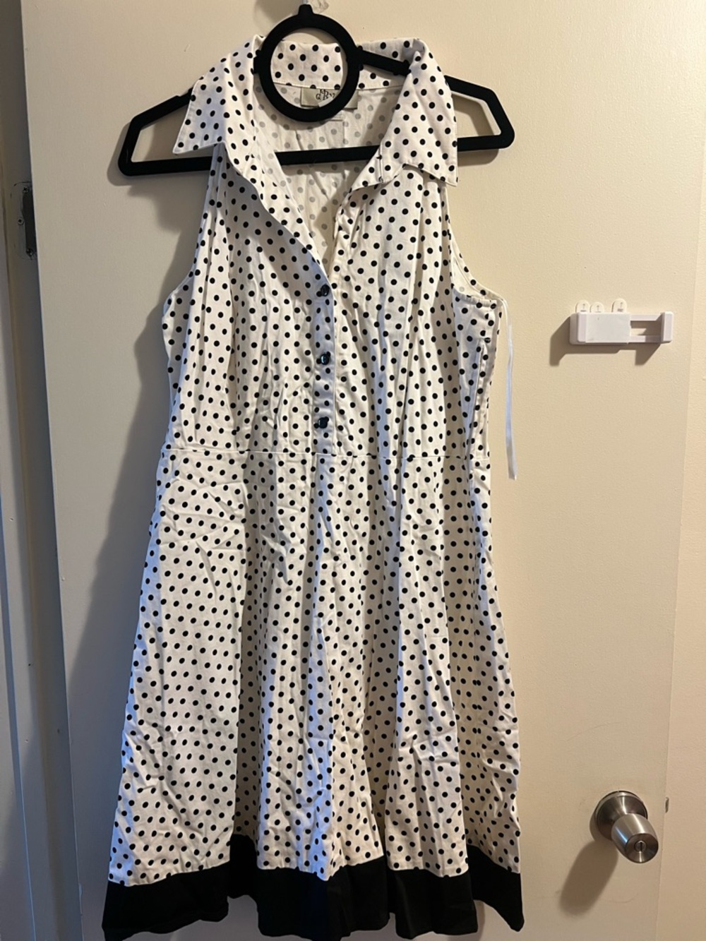 Sleeveless White Polka Dot Midi Dress with Black Trim